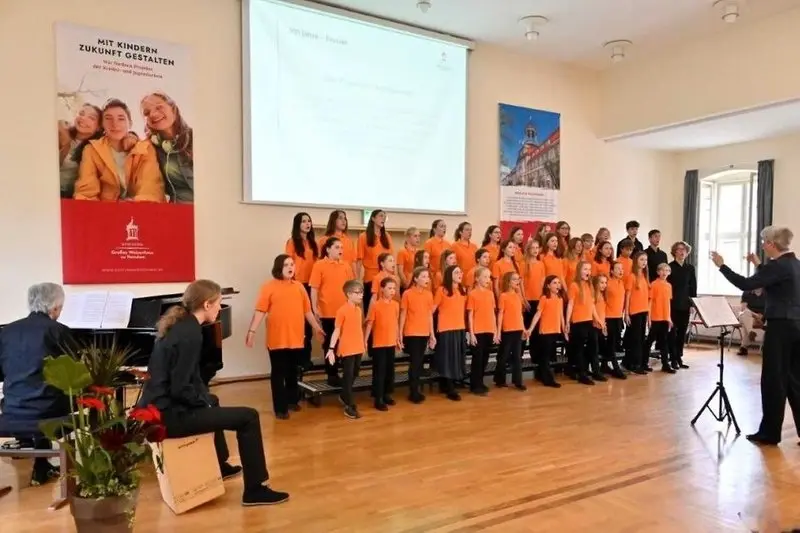 Koncert dětských pěveckých sborů Osmikvítek a Kinder- und Jugendchor der Singakademie Potsdam