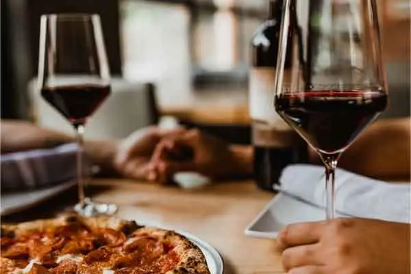 Tuesday Wine & Pizza Night - 50% Off Wine Bottles with Pizza Purchase - Dine In Only.